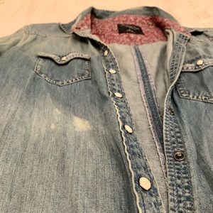 Distressed denim button down